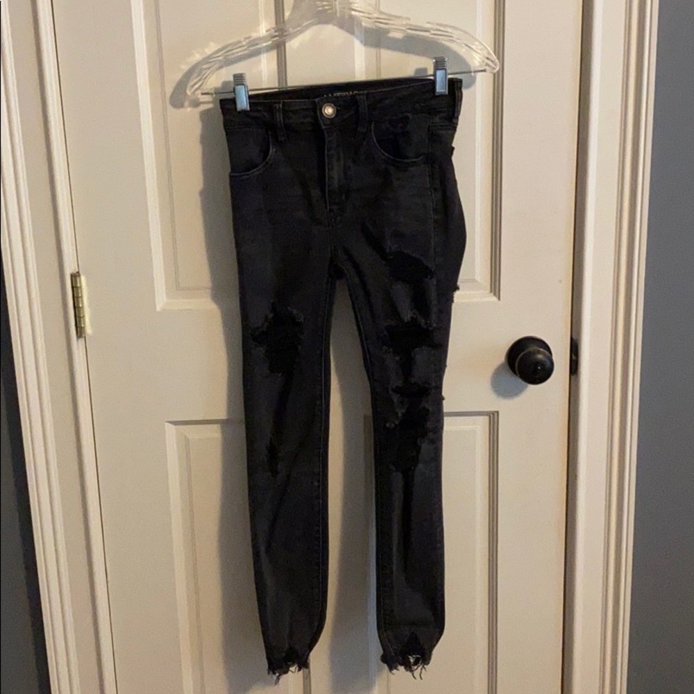 black ripped American Eagle skinny jeans
